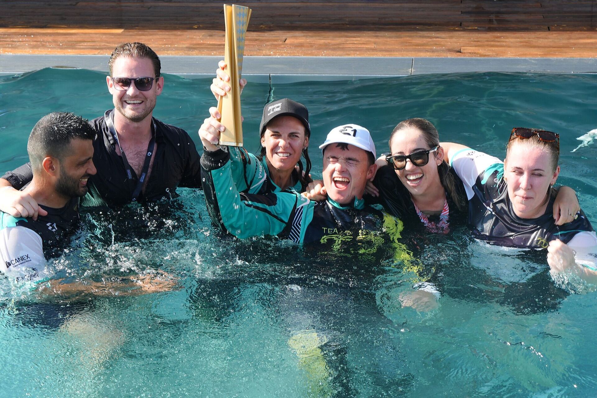 Team Drogba celebrating in the water — E1 Monaco 2026